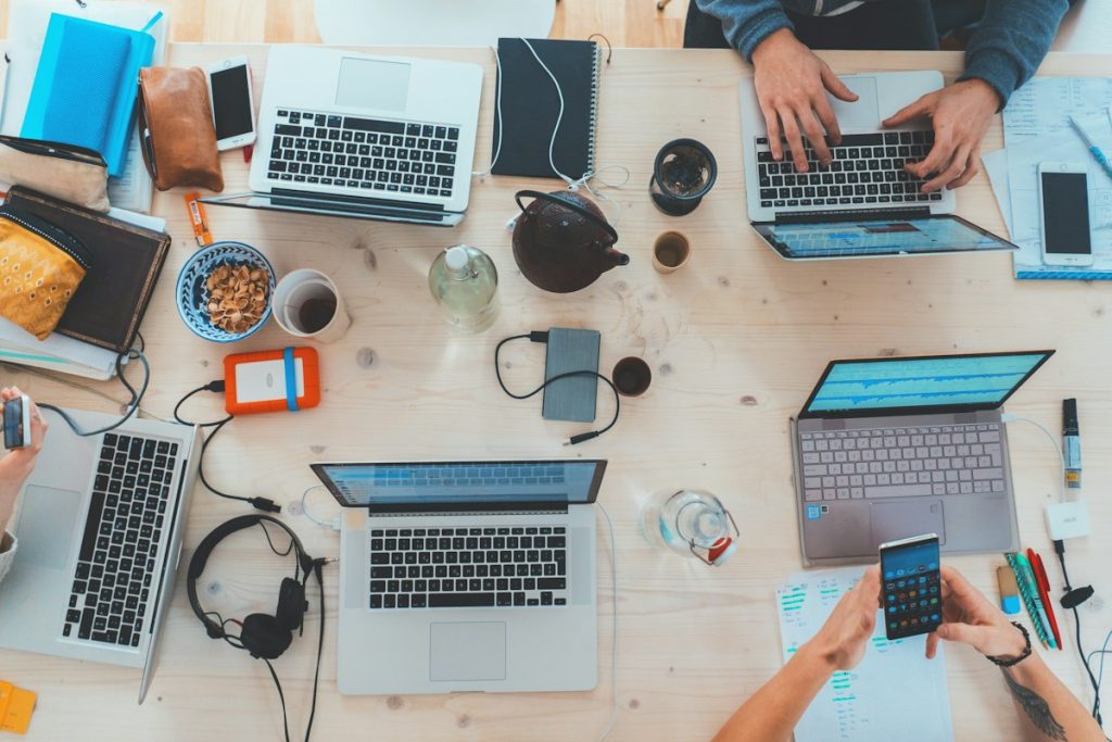 Creative Engineers and Designers Collaborating in Office